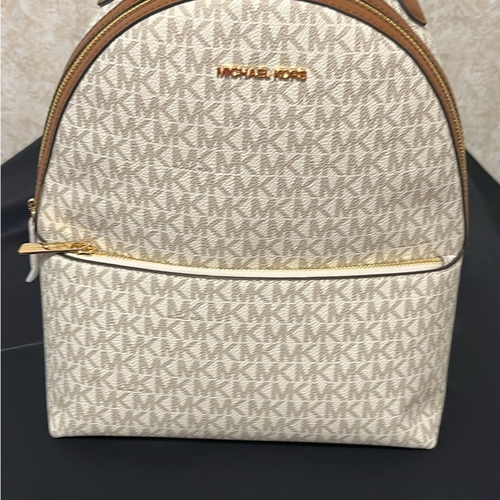 Michael Kors Cream Signature Logo Mini Backpack with Tan Trim